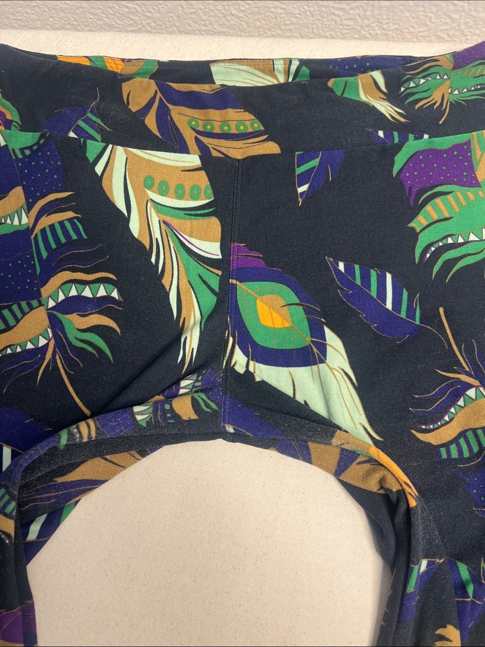 LuLaRoe Black Feather Print Leggings with Green, Purple & Gold Accents - Picture 4 of 5